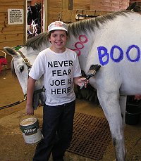 "Never Fear, Joe is here" to paint our horses in Halloween colors. Jordie and Grayboo. - October 29, 2005 