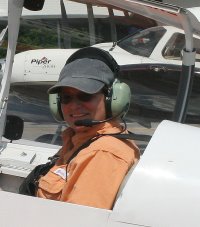 Elizabeth has a pilot's license but has no time or money to fly anymore - she has horses! 