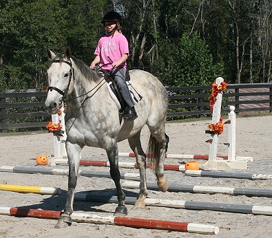 Ten year old Kristen is learning to ride on Barbo. October 28, 2007