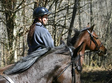 Knight Villain and Tammy Gullet enjoy a ride in the forest. March 4, 2007