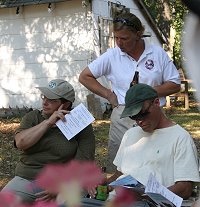 Karen, Meridth and Jim checking over the entries for the hound show.