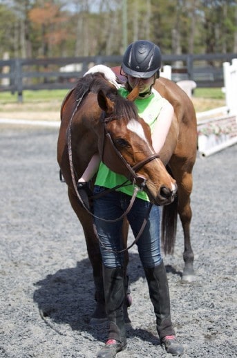 OTTB Maybe Satisfied and his current owner.