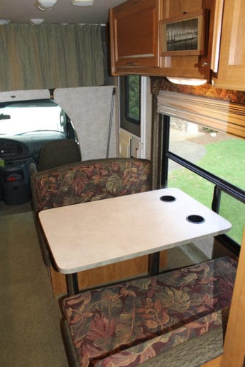 Dinette lowers to make another sleeping area.